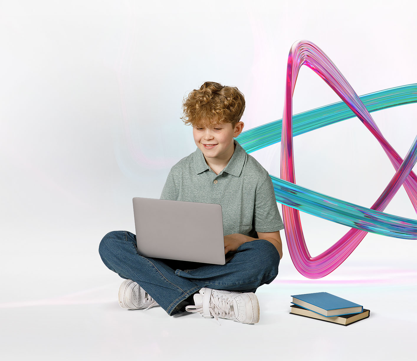 Boy doing his homework on a laptop